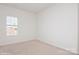 Simple bedroom with carpeted floor and a window with blinds at 33 Woodsdale Se Pl, Concord, NC 28025