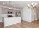 Modern kitchen with stainless steel appliances and an island at 33 Woodsdale Se Pl, Concord, NC 28025