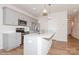 Modern kitchen with stainless steel appliances and an island at 33 Woodsdale Se Pl, Concord, NC 28025