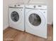 Laundry room with side-by-side washer and dryer at 33 Woodsdale Se Pl, Concord, NC 28025