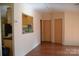 Galley kitchen with pass-through window and stainless steel appliances at 3300 Bendwood Rd, Newton, NC 28658