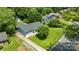Aerial view of a charming home with a well-maintained lawn and a lovely tree at 3531 Enfield Rd, Charlotte, NC 28205
