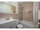 Bathroom with modern fixtures, tiled shower, and updated vanity at 3531 Enfield Rd, Charlotte, NC 28205