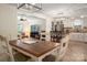 Open concept home with dining area flowing into the kitchen and living spaces at 3531 Enfield Rd, Charlotte, NC 28205