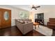 Cozy living room with hardwood floors, a large window, and comfortable seating at 3531 Enfield Rd, Charlotte, NC 28205