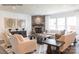 Cozy living room featuring a stone fireplace, neutral colored sofas, and large windows at 3531 Rapport Ct # 024, Lancaster, SC 29720