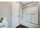 Bright bathroom featuring a bathtub with sliding glass doors at 354 Baptist Church Rd, Gold Hill, NC 28071