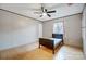 Bedroom features a modern ceiling fan and a window for natural light at 354 Baptist Church Rd, Gold Hill, NC 28071