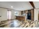 Cozy kitchen featuring dark cabinetry, an island sink, and modern appliances at 354 Baptist Church Rd, Gold Hill, NC 28071