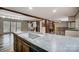 Spacious kitchen features a large countertop, modern fixtures, and seamless access to the living area at 354 Baptist Church Rd, Gold Hill, NC 28071