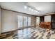 Bright living room with large windows and stylish flooring, perfect for entertaining or relaxing at 354 Baptist Church Rd, Gold Hill, NC 28071