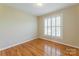 Bright bedroom with hardwood floors and plantation shutters at 3624 Ramsey Rd, Sharon, SC 29742