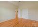 Hardwood floor bedroom with spacious closet and access to another room at 3624 Ramsey Rd, Sharon, SC 29742