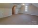 Bonus room with carpeted floor and window with shutters at 3624 Ramsey Rd, Sharon, SC 29742