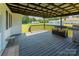 Covered deck with seating and grilling area at 3624 Ramsey Rd, Sharon, SC 29742