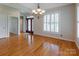 Hardwood floors, chandelier, and access to the foyer at 3624 Ramsey Rd, Sharon, SC 29742