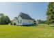 Side view of the house showcasing the landscaping at 3624 Ramsey Rd, Sharon, SC 29742