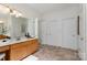 Bright bathroom with double vanities, tiled floors, and ample cabinet space at 4316 Mourning Dove Dr, Matthews, NC 28104