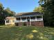 Ranch home with brick facade and front porch at 475 Cornerstone Dr, Taylorsville, NC 28681