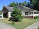 House exterior showcasing garage and side yard at 475 Cornerstone Dr, Taylorsville, NC 28681