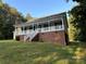 One-story house with porch and brick foundation at 475 Cornerstone Dr, Taylorsville, NC 28681