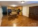 Kitchen with island, stainless steel appliances, and hardwood floors at 475 Cornerstone Dr, Taylorsville, NC 28681