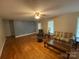 Living room with hardwood floors and neutral walls at 475 Cornerstone Dr, Taylorsville, NC 28681