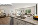 Modern kitchen island with granite countertops and stainless steel appliances at 5146 Hyrule Dr, Charlotte, NC 28262