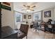 Bedroom with natural light, a ceiling fan, and dual desk spaces at 5483 Paulmo Dr, Charlotte, NC 28216