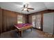 Basement recreation room with pool table and large windows at 6017 Millbury Ct # 16, Charlotte, NC 28211