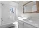 Clean bathroom with white tile and vanity at 6017 Millbury Ct # 16, Charlotte, NC 28211