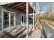 Spacious deck with wooded views and white railings at 6017 Millbury Ct # 16, Charlotte, NC 28211