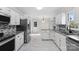 Modern kitchen boasting granite countertops and stainless steel appliances at 6017 Millbury Ct # 16, Charlotte, NC 28211