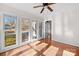 Bright sunroom with hardwood floors and multiple windows at 6017 Millbury Ct # 16, Charlotte, NC 28211