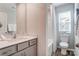 Clean bathroom featuring a tub-shower combo, white cabinets and modern fixtures at 624 Cassidy Ct, Clover, SC 29710