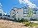 A beautiful home boasts a welcoming exterior with blue accents, and a well maintained lawn at 624 Cassidy Ct, Clover, SC 29710