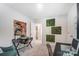 Home office with green decor, multiple desks, and ample natural light at 624 Cassidy Ct, Clover, SC 29710