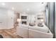 Bright living room with a fireplace, comfortable seating, and an open layout that seamlessly connects to other living spaces at 624 Cassidy Ct, Clover, SC 29710
