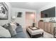 Comfortable living room with modern decor, plush seating, and a flat-screen television at 624 Cassidy Ct, Clover, SC 29710
