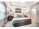 A spacious main bedroom with tray ceiling, art, and stylish decor at 624 Cassidy Ct, Clover, SC 29710