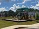 Community playground with a variety of play structures and a safe, cushioned ground cover at 624 Cassidy Ct, Clover, SC 29710