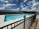 Community pool with lounge chairs ready for residents to enjoy on a sunny day at 624 Cassidy Ct, Clover, SC 29710