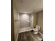 Updated bathroom with a large walk-in shower and modern fixtures at 721 Governor Morrison St, Charlotte, NC 28211