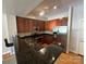 Modern kitchen with stainless steel appliances and granite countertops at 721 Governor Morrison St, Charlotte, NC 28211