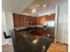 Modern kitchen with stainless steel appliances and granite countertops at 721 Governor Morrison St, Charlotte, NC 28211