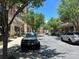 Street view of a shopping center with shops and parked cars at 721 Governor Morrison St, Charlotte, NC 28211