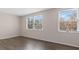 Spacious bedroom with wood flooring and large windows at 7530 Holly Grove Ct, Charlotte, NC 28227