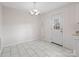 Light and airy dining area with tile floors at 7530 Holly Grove Ct, Charlotte, NC 28227