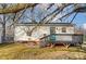 View of the back of the home with painted door and a back deck at 776 Washington Ln, Kannapolis, NC 28083