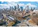 Aerial view of the city skyline and neighborhoods, showcasing urban living at 780 N Davidson St, Charlotte, NC 28202